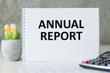 Notepad with text Annual Report. Business concept
