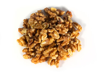 Walnut Nuts in Heap or Pile in Top Down, Flat Lay, or Bird's Eye View, Isolated on White