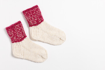 knitted wool socks on a white background