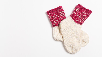 knitted wool socks on a white background