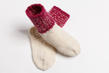 knitted wool socks on a white background