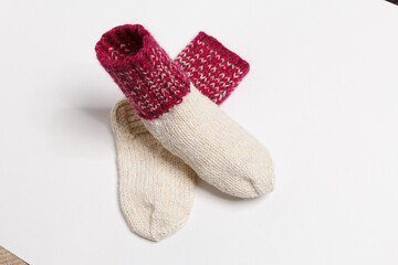 knitted wool socks on a white background