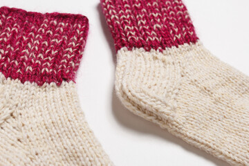 knitted wool socks on a white background