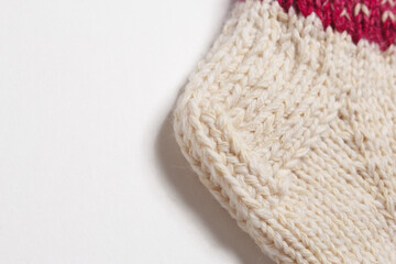 knitted wool socks on a white background