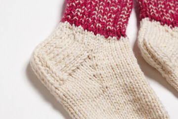 knitted wool socks on a white background