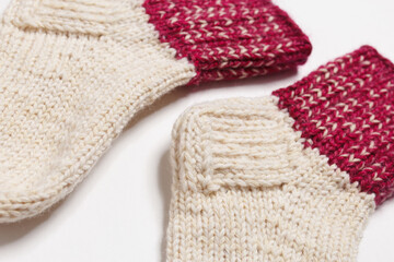 knitted wool socks on a white background