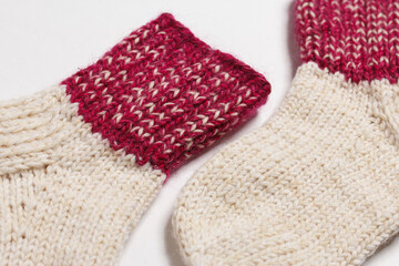 knitted wool socks on a white background