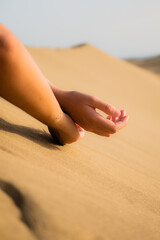 Girl exploring some sand dunes