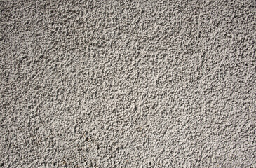 sunlight on the roughcast at a facade