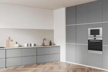 Fototapeta na wymiar Light kitchen set interior with sink and dresser, kitchenware and shelf with oven