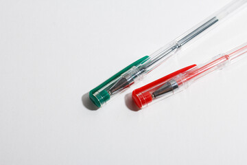 colored gel pens for writing on a white background