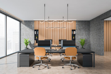 Office workplace interior with furniture, pc computer and window with city view