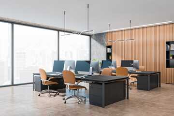 Office workplace interior with furniture, pc computer and window with city view
