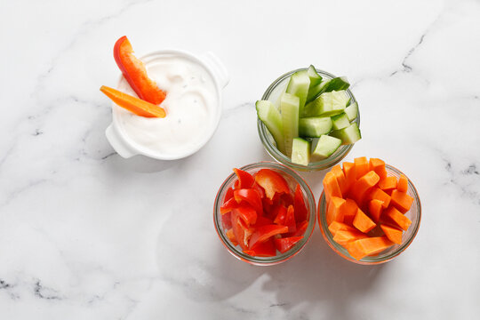 Fresh vegetable sticks. Snack for diet. Top view. Carrot, cucumber and bell pepper.