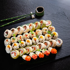 sushi on the black background