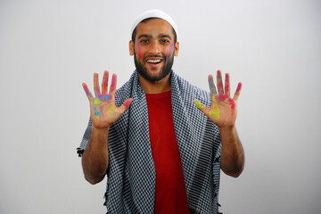 Naklejka premium Young Muslim boy Going for Play Holi
