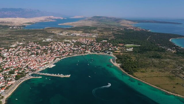 Panoramic View On The Touristic Town Of Novalja On The Island Of Pag, Croatia - aerial drone shot