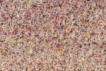 Namibia, pink grains of sand on the dunes, colorful background
