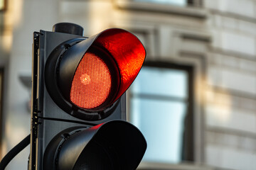 Close up of a traffic light on red