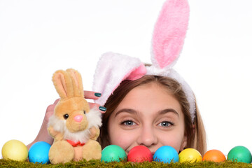 Easter girl look out in rabbit bunny ears with egg hunt. Child bunny ears. Isolated.