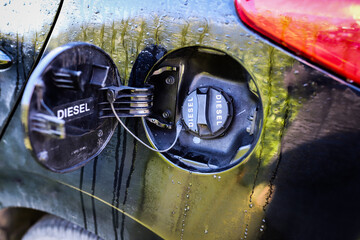 Close up detail of diesel car fuel cap tank cover closed
