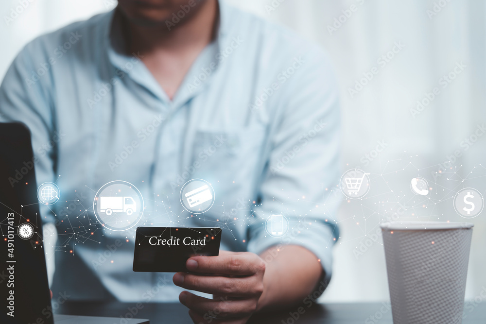 Poster shopper holding credit card and input shopping order by use computer laptop with online shopping and