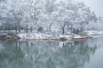 Fototapeta na wymiar Winter Snow Scenery in Cherry Blossom Garden in East Lake Scenic Area, Wuhan, Hubei