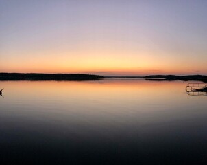 Naklejka premium sunset over the lake