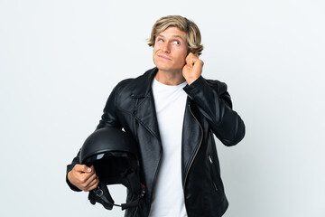 Naklejka premium English man holding a motorcycle helmet frustrated and covering ears