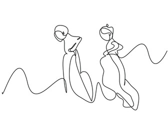 Children play in a race by moving in sacks on the playground outside.