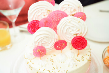 Beautiful cake decoration. Zevir on sticks of different colors