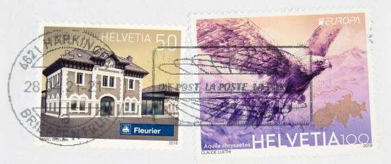 briefmarke stamp gestempelt used frankiert gebraucht cancel papier paper adler eagle lila purple elegant helvetia schweiz swiss building gebäude bird vogel