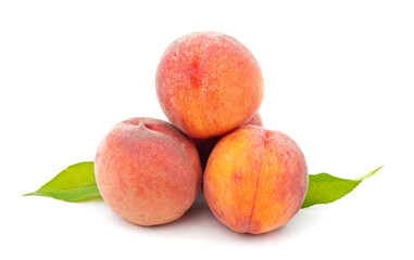Fototapeta na wymiar Three ripe peaches.