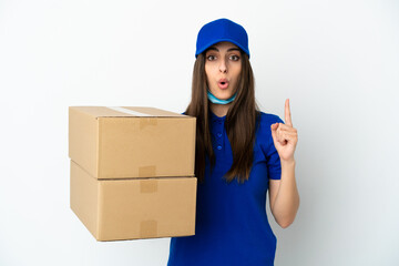 Delivery caucasian woman isolated on white background intending to realizes the solution while lifting a finger up
