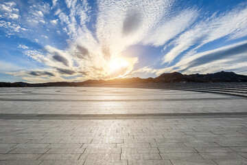Empty square floor and beautiful sky clouds at sunrise