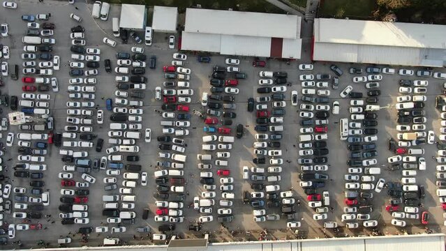 Aerial view new cars lined up in the port for import and export.