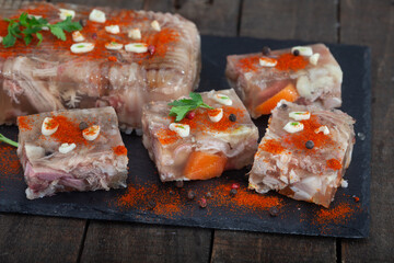 Pihtije - serbian traditional dish - aspic with pork meat and vegetables. Meat jelly - holodets,...