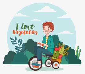 Cute boy with fresh vegetables rides on bicycle in the garden. Summer time