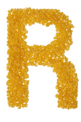 Letter R made from food on a white background
