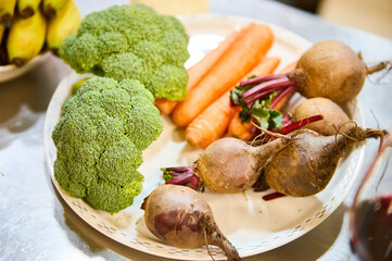 Dish with Broccoli, Beetroot and other ingredients in the kitchen
