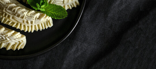 Homemade sweets from gazelle horns for Ramadan. detail close up shot