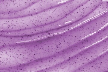 Fototapeta na wymiar Cosmetic cream scrub for face, body or scalp. Texture background. Blueberry purple