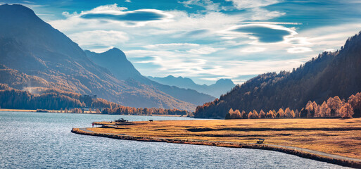 Fantastic morning scene of Silvaplana lake. amazing autumn view of Switzerland, Maloja Region, Swiss canton of Graubünden, Europe. Beauty of nature concept background.