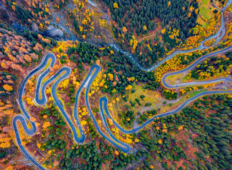 Straight-down view from flying drone of Maloya pass. Colorful morning scene in Swiss Alps, Upper Engadine in canton of the Grisons, Switzerland, Europe. Traveling concept background.