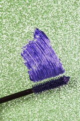 Blue purple mascara brush stroke smeared shimmer green geometric background background