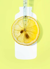 Aha citric acid or vitamin c cosmetic product with dropper on yellow background