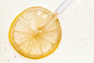 Aha citric acid or vitamin c cosmetic product with dropper on yellow background