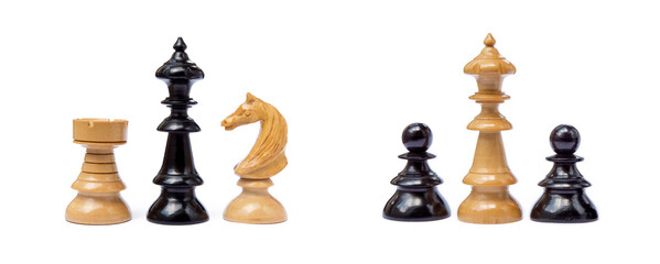 Old chess pieces isolated on white background