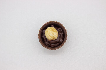 One chocolate candy with filling