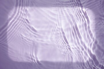 Splash purple cosmetic moisturizer water, micellar toner, or emulsion abstract background. 